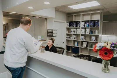 patient checking out at Exquisite Dentistry