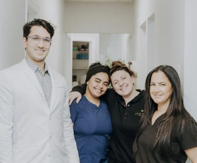 Melrose dentist Dr. Sanjay Talluri and his Exquisity Dentistry staff